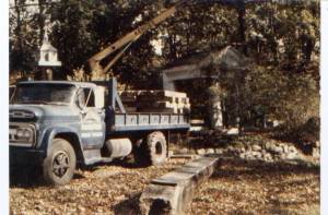 Installing the portico in the Old Ordinary's garden (1979)